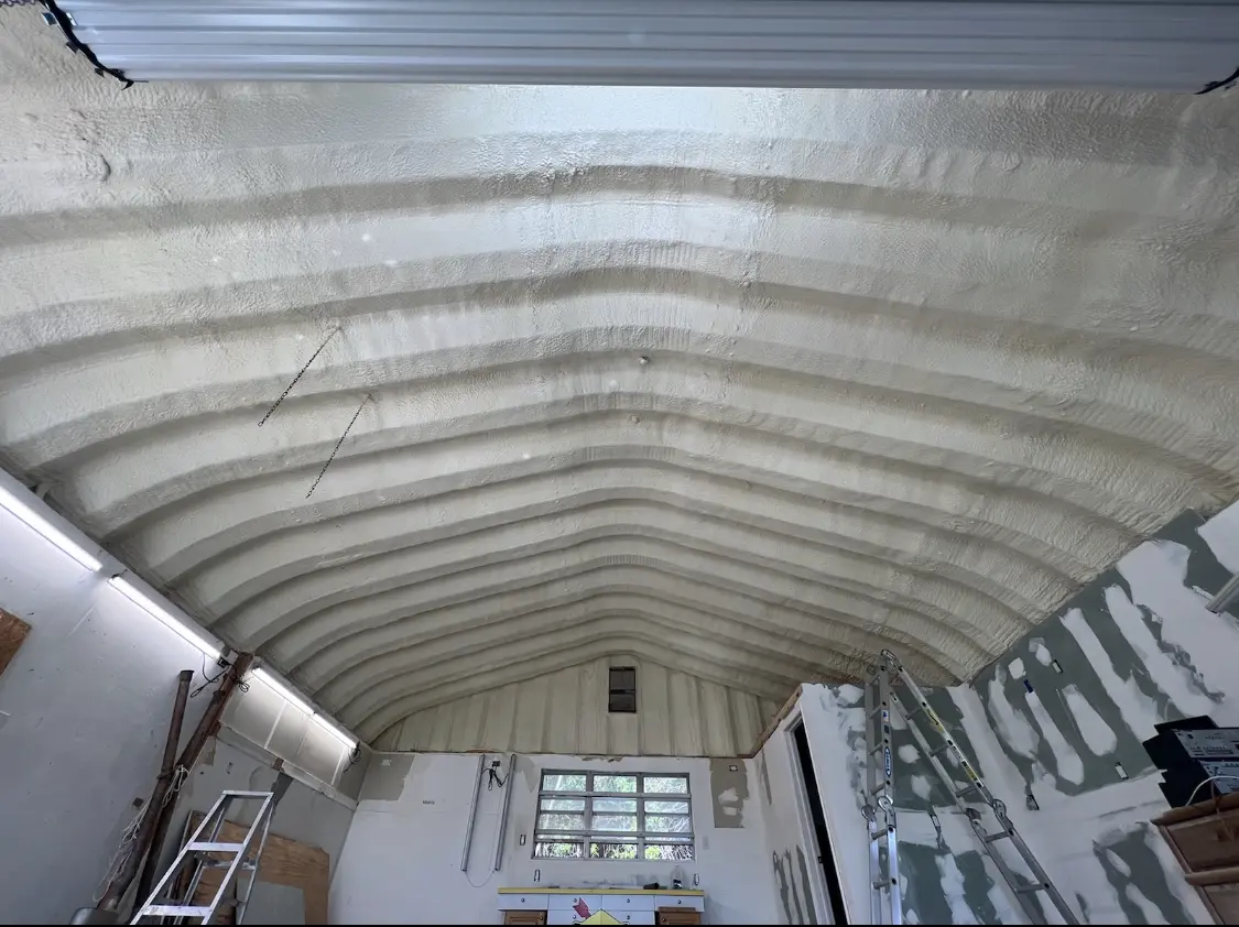 Spray polyurethane foam applied to the underside of a metal roof deck in Loudoun Valley Estates